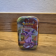 Pokémon Scarlet & Violet Prismatic Evolutions Mini Tin met Espeon artwork.