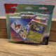 Pokémon Scarlet & Violet: Prismatic Evolutions Tech Sticker Collection met Leafeon promo kaart, tech stickers en boosterpacks.