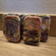 Overzicht van meerdere Pokémon Scarlet & Violet: Shrouded Fable Mini Tins met verschillende artworkvarianten.