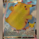 Voorkant van Surfing Pikachu VMAX 009/025 Holo Rare VMAX uit Celebrations
