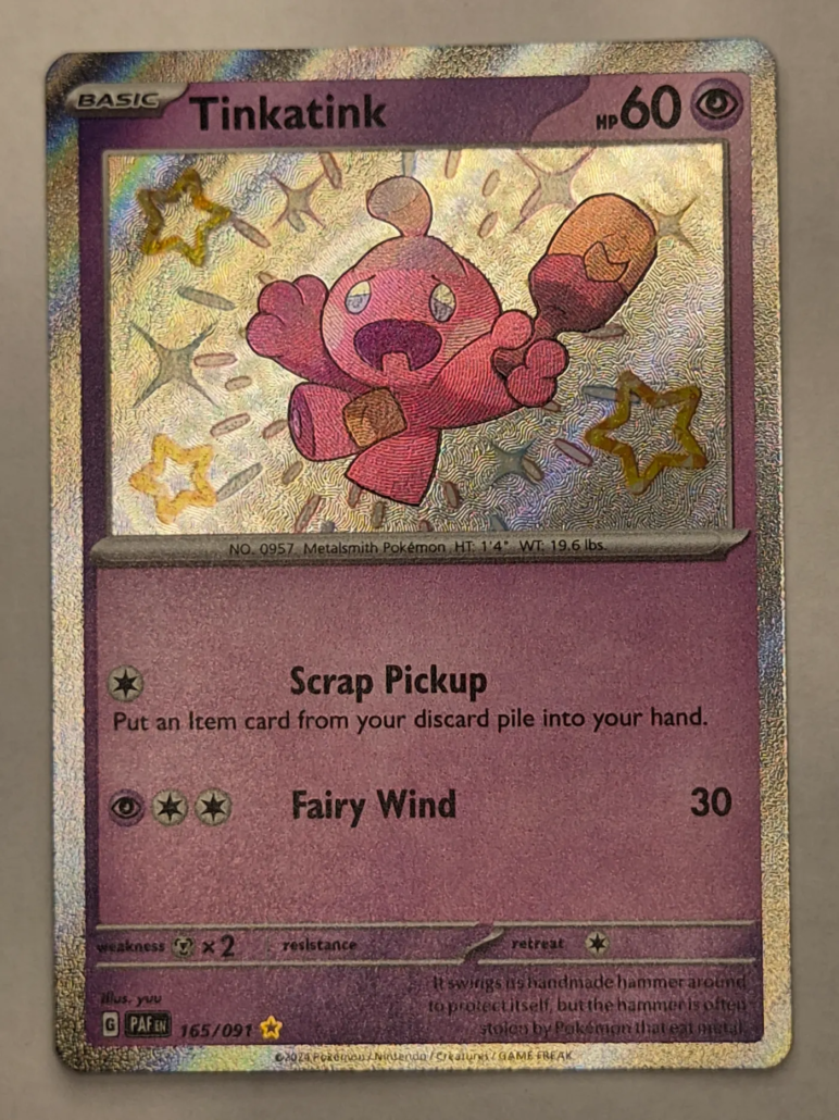 Voorkant van Tinkatink 165/091 Shiny rare uit Paldean Fates